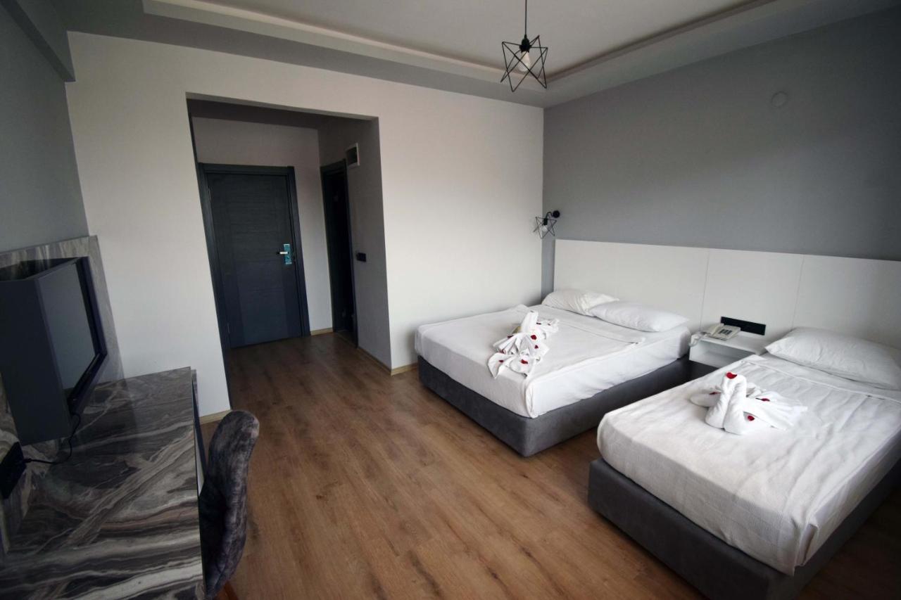 Dreibettzimmer mit Balkon